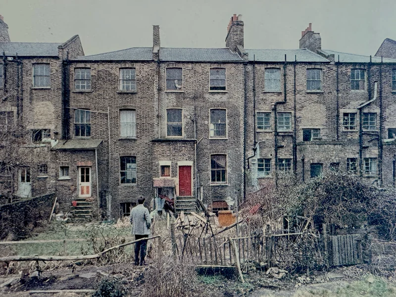 Resident looks at back of terrace